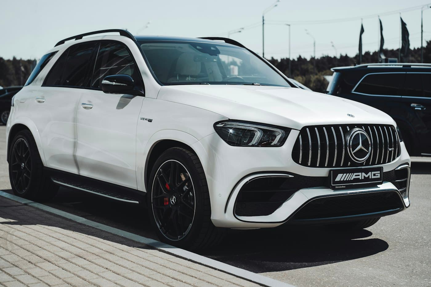 White Mercedes-AMG GLE parked on a city street