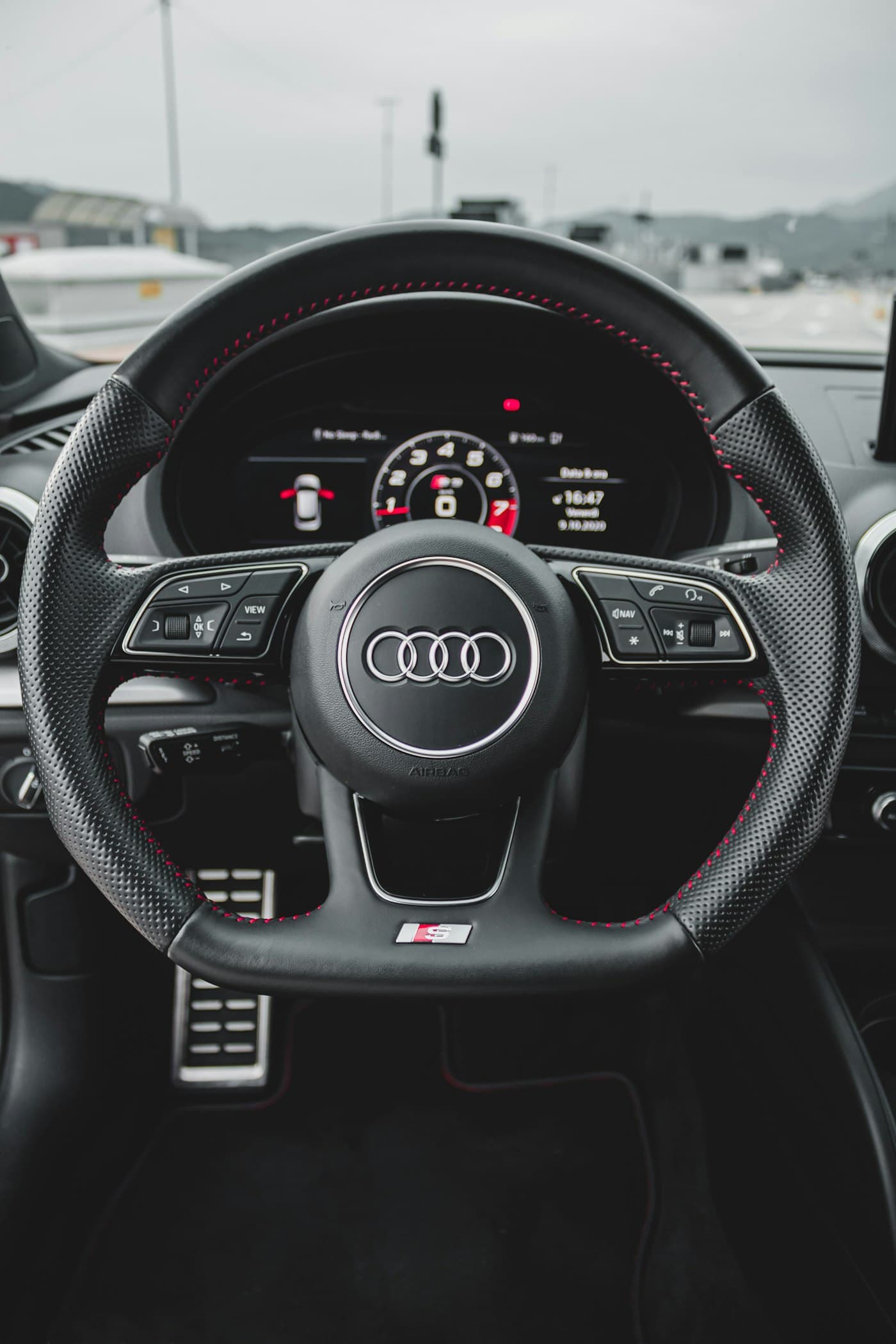Audi steering wheel and instruments — representative image