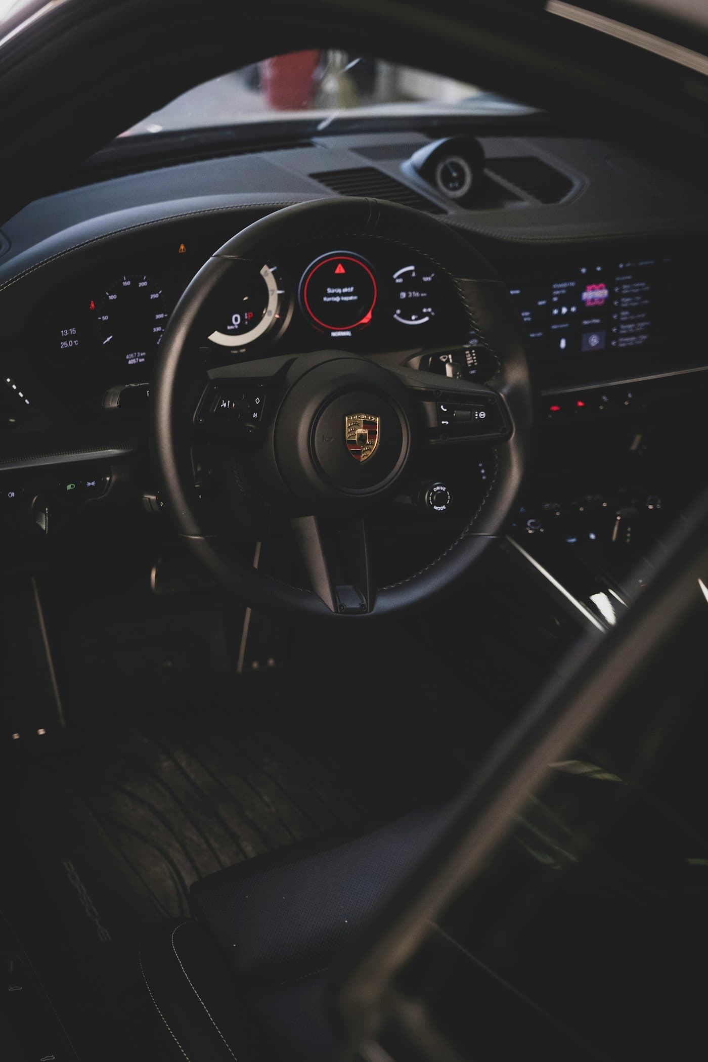 Porsche dashboard at night — representative image